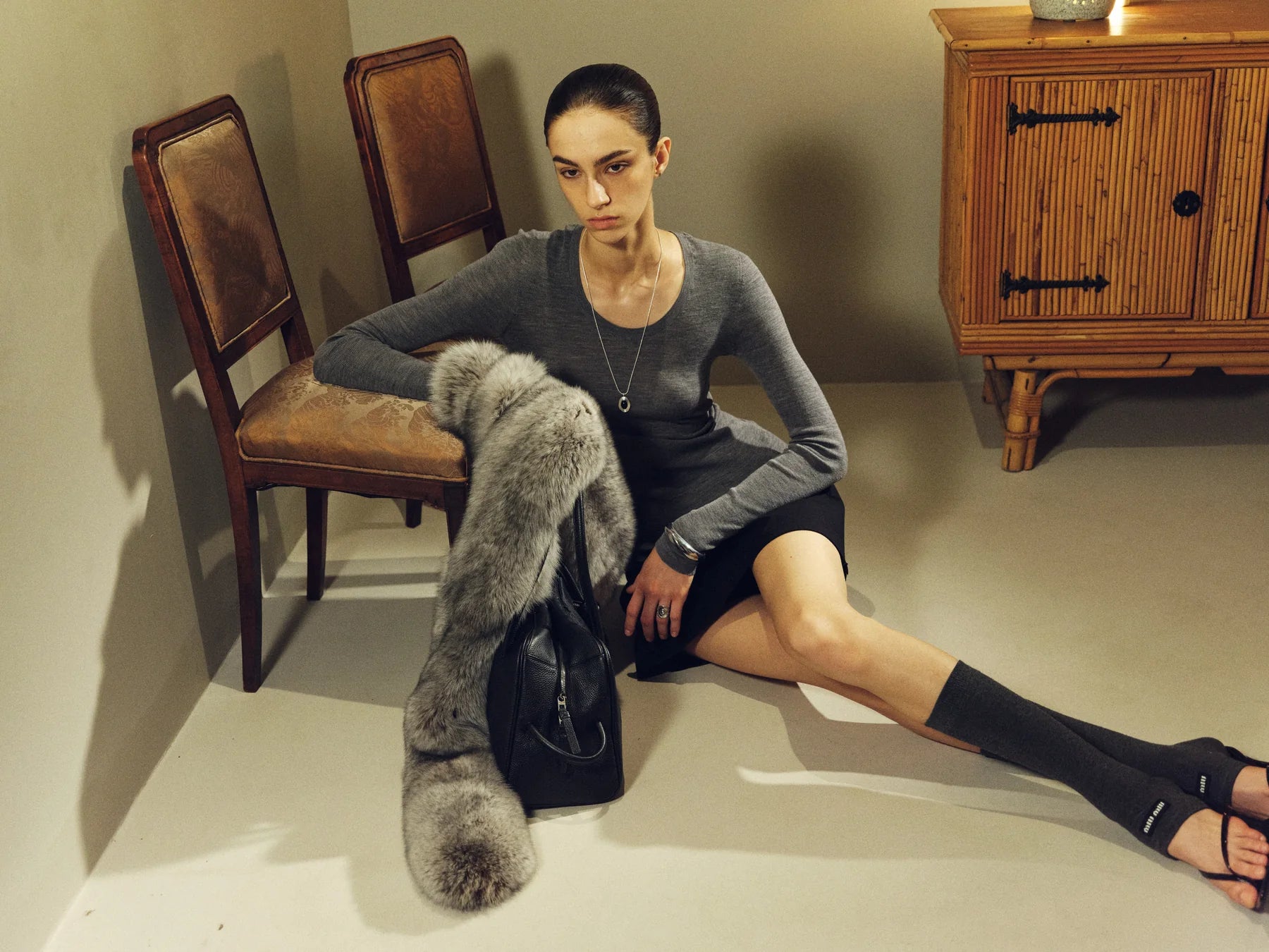 Fur outfit with visible heels for lower-half proportion