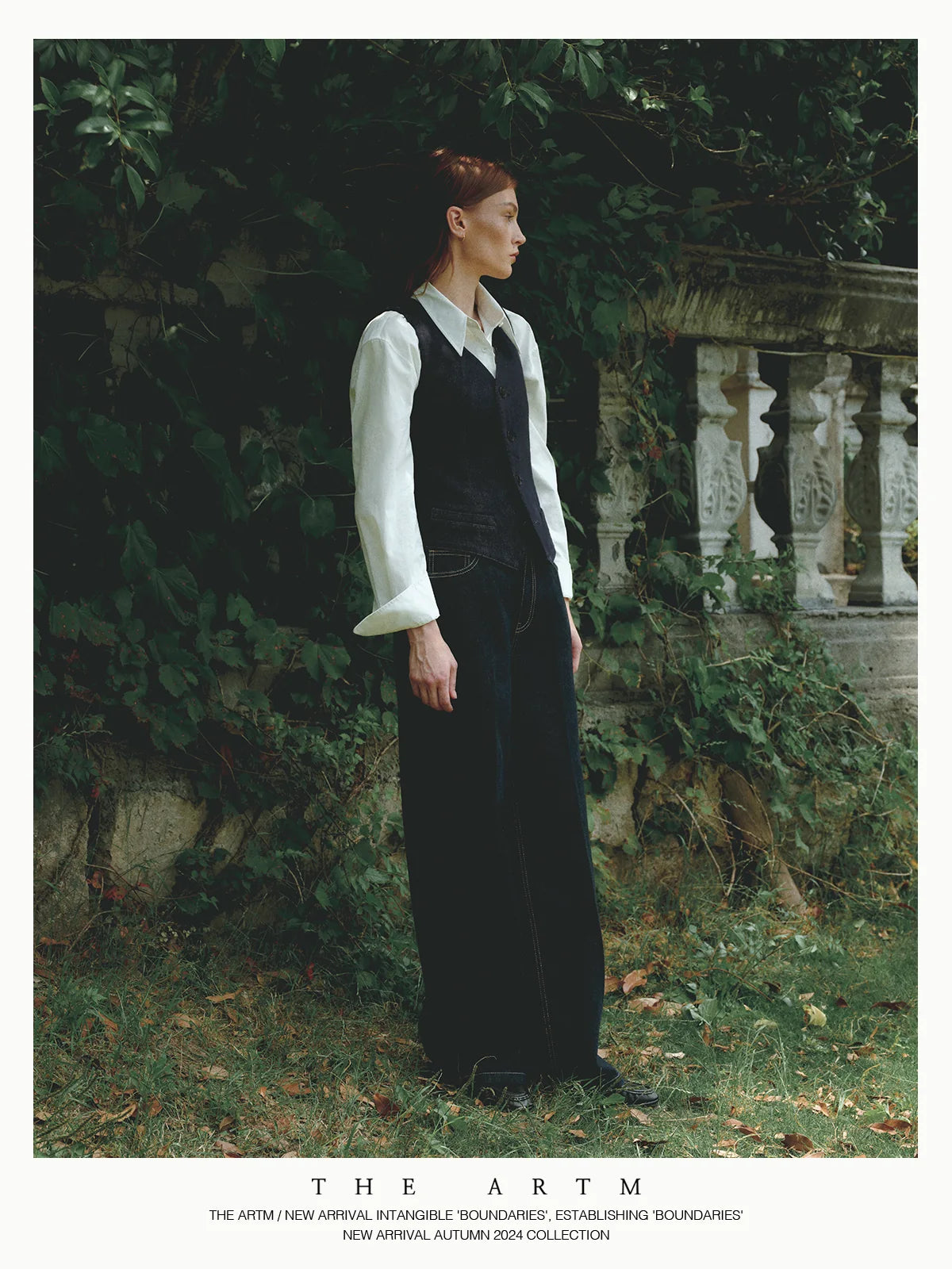 Long dark outfit showing shoe visibility below a winter layer