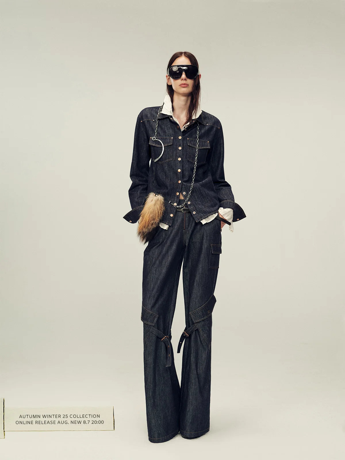 Wide trouser outfit with dark shoes for footwear weight balance