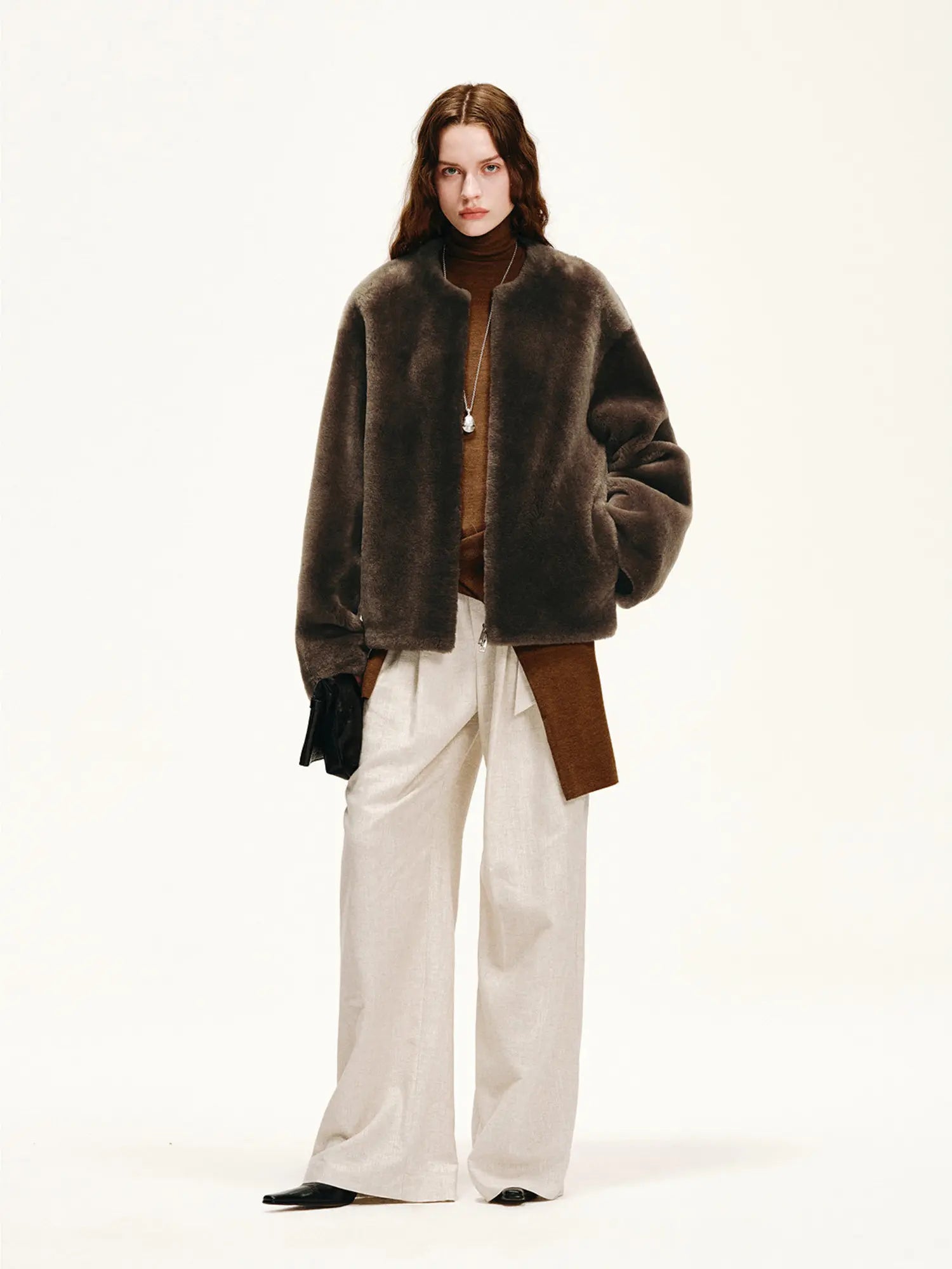 Dark brown Merino shearling jacket with relaxed short silhouette