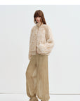 Side view of Firelady Fur William Cream Frost Cream Apricot rabbit fur knit jacket