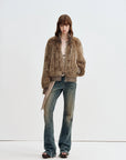 Model wearing Firelady Fur William Cream Frost rabbit fur knit jacket in Mist Gray Amber full length