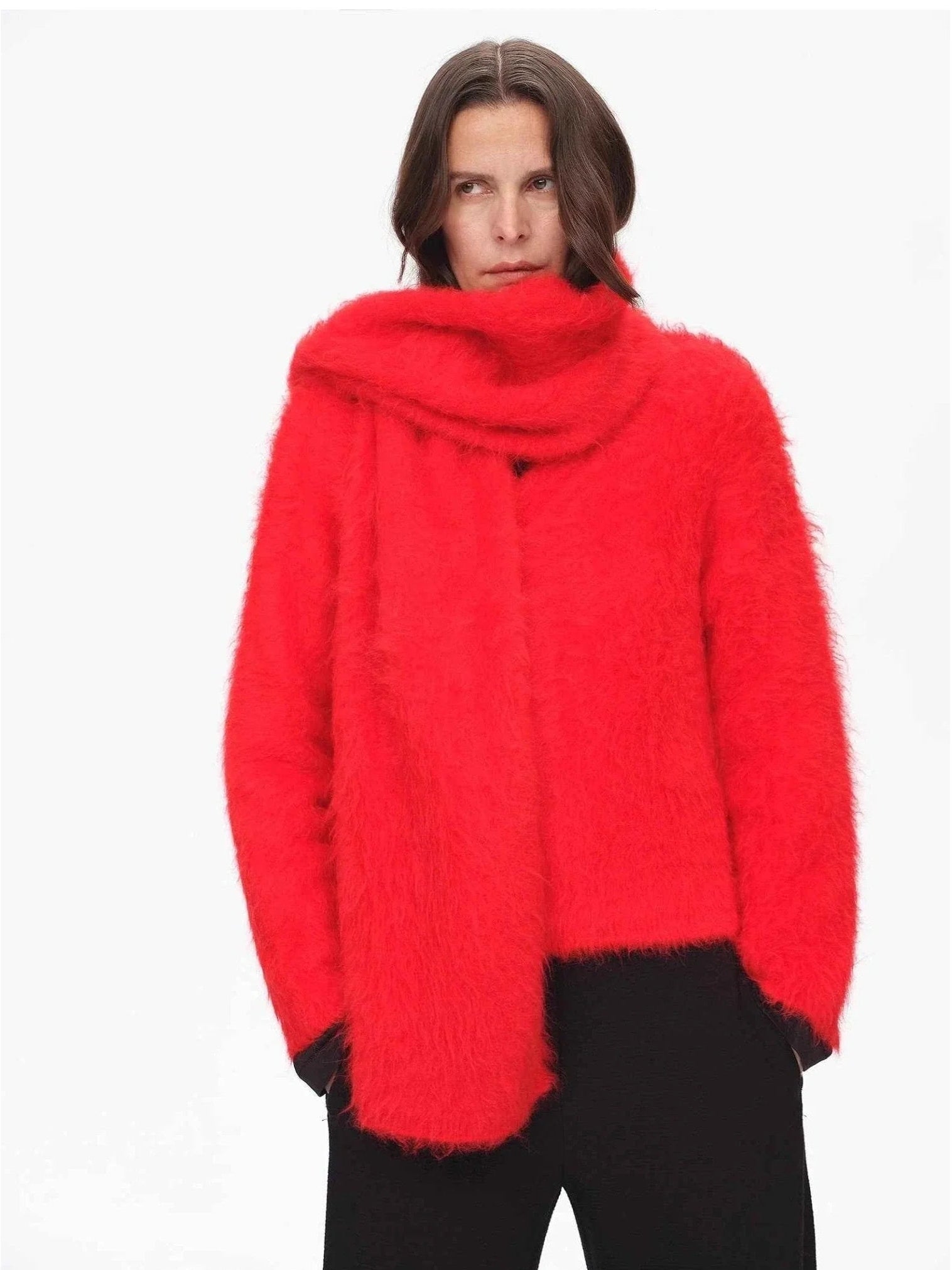 Woman wearing a red alpaca wool scarf in a front styling view