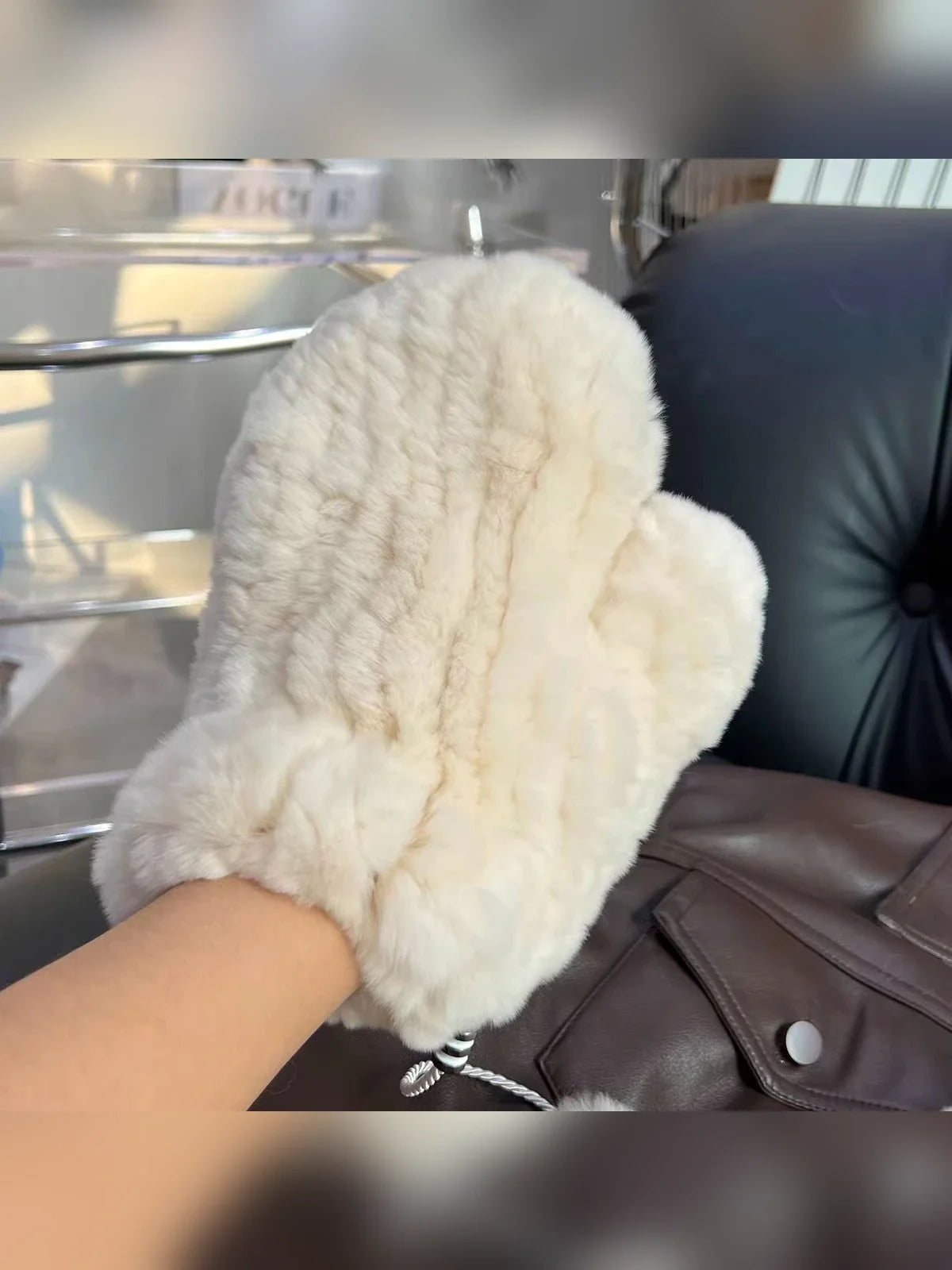 White rex rabbit fur mittens for women styled on hand