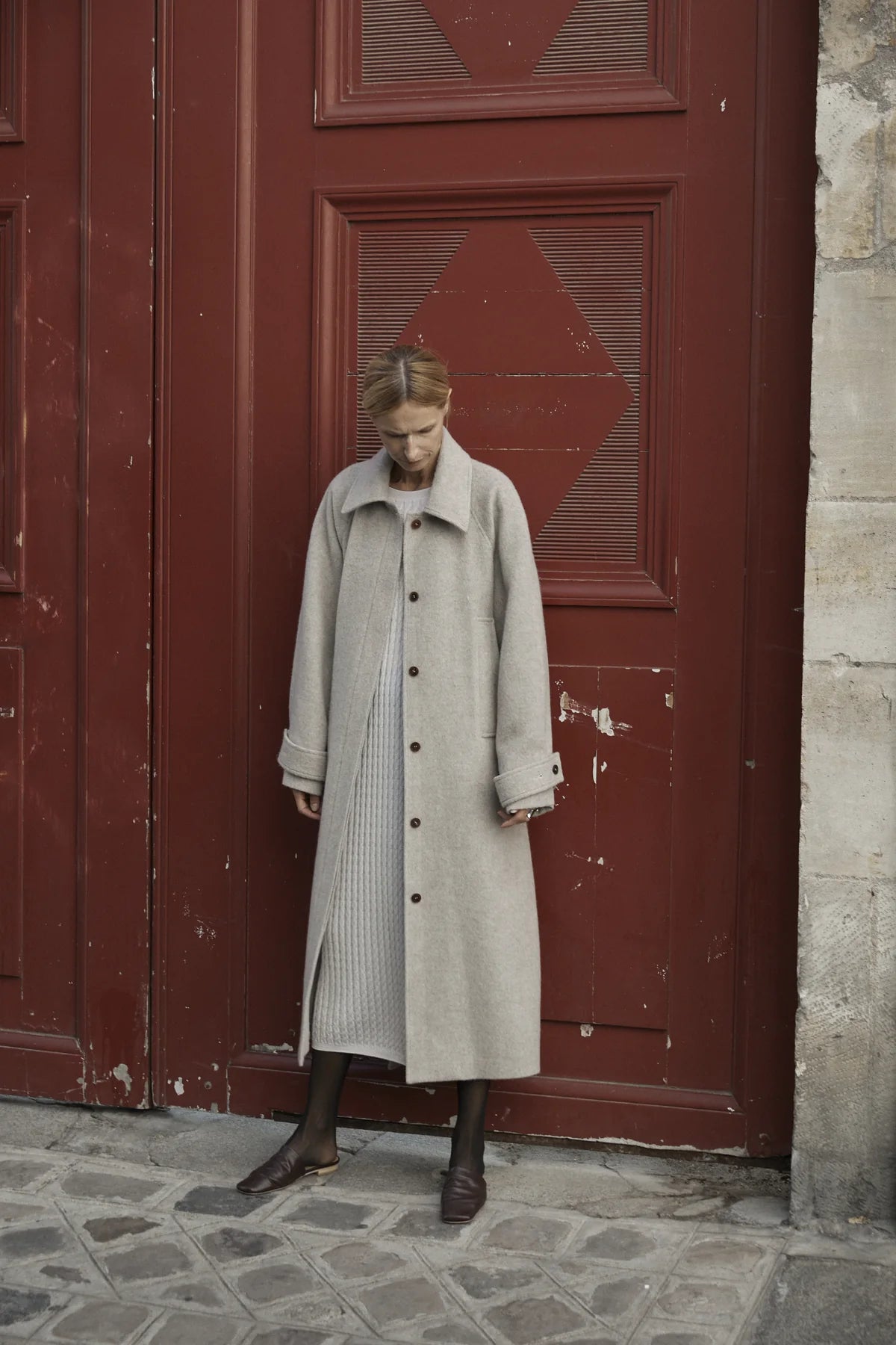 Full-length cream coat reference for long outerwear proportion