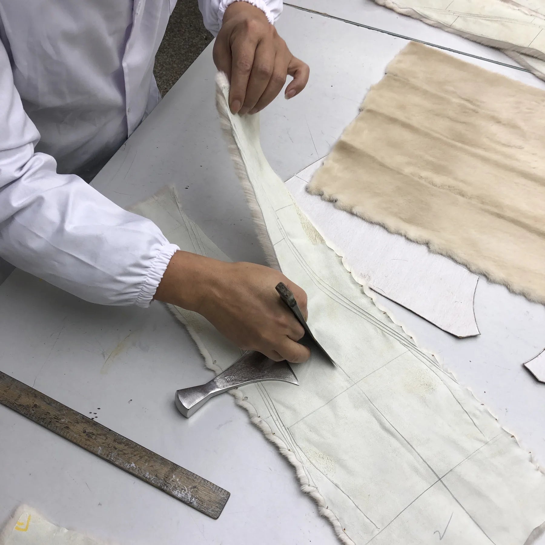 Lining inspection visual for checking hidden condition before buying a fur coat
