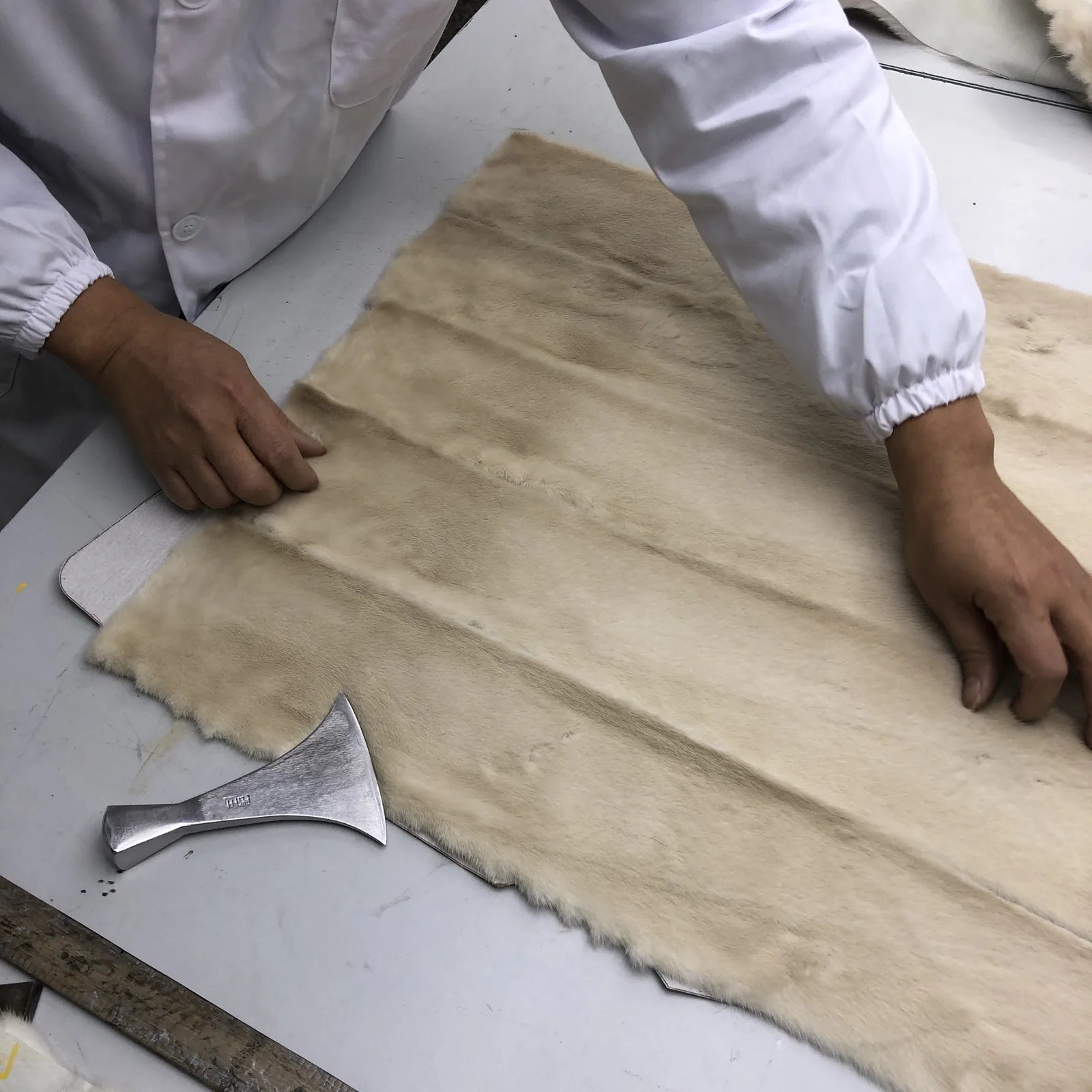 Fur material detail used to judge resale condition and long term value before buying