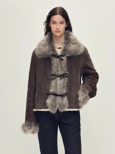 Woman wearing the Florence dark brown Merino shearling fox fur collar coat, front view