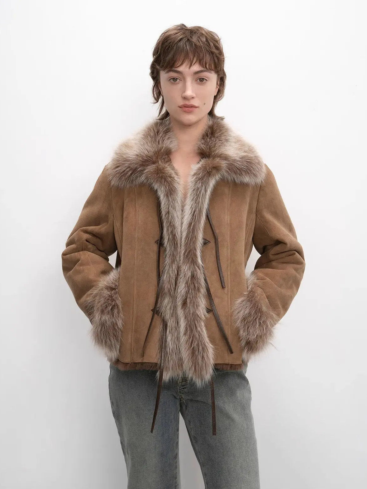 Woman wearing the Florence macchiato shearling fox fur collar coat, front view