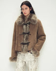 Florence macchiato Merino shearling coat, three-quarter styling view
