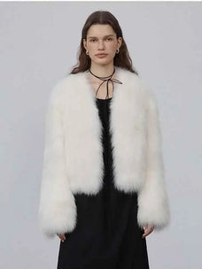 Model wearing Free Spirit Classic White short fox fur and leather coat