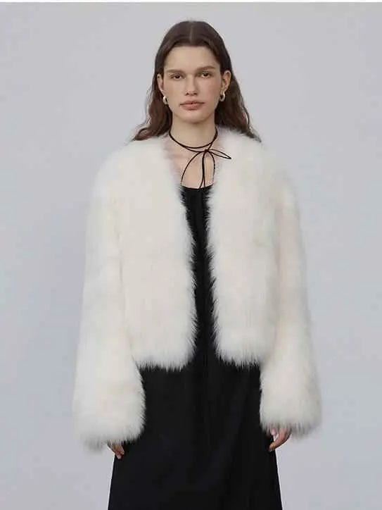 Model wearing Free Spirit Classic White short fox fur and leather coat