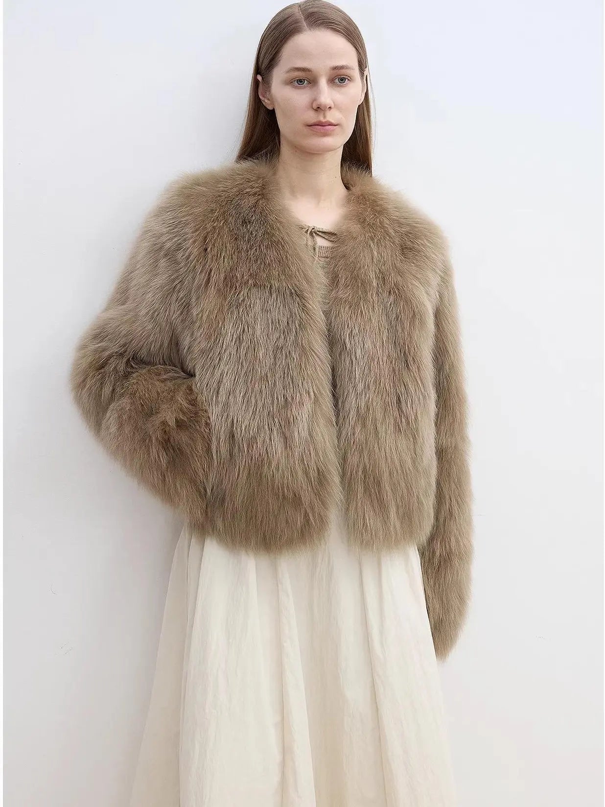 Model wearing Free Spirit Mocha short fox fur and leather coat