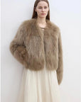 Model wearing Free Spirit Mocha short fox fur and leather coat
