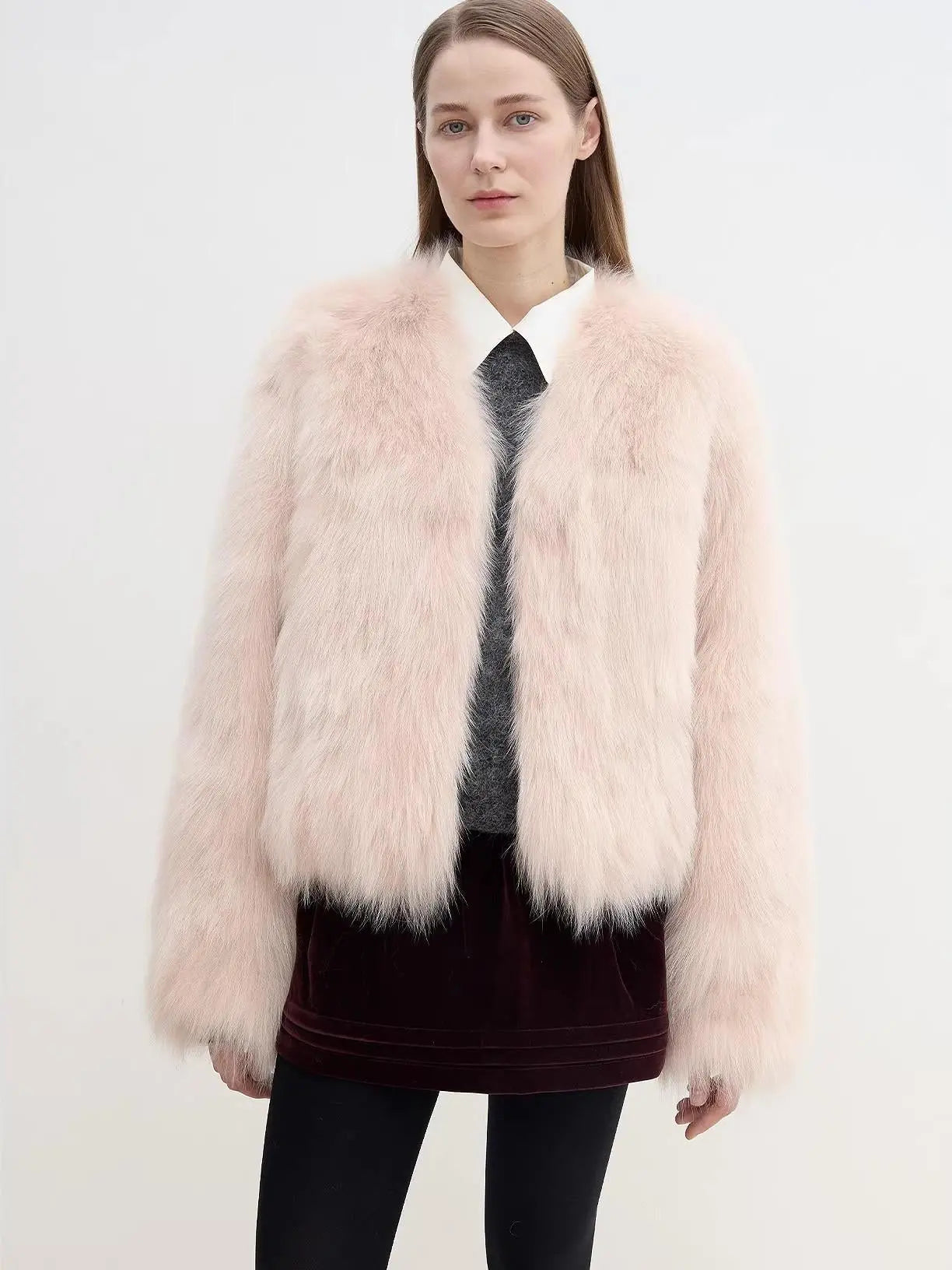 Model wearing Free Spirit Pink short fox fur and leather coat