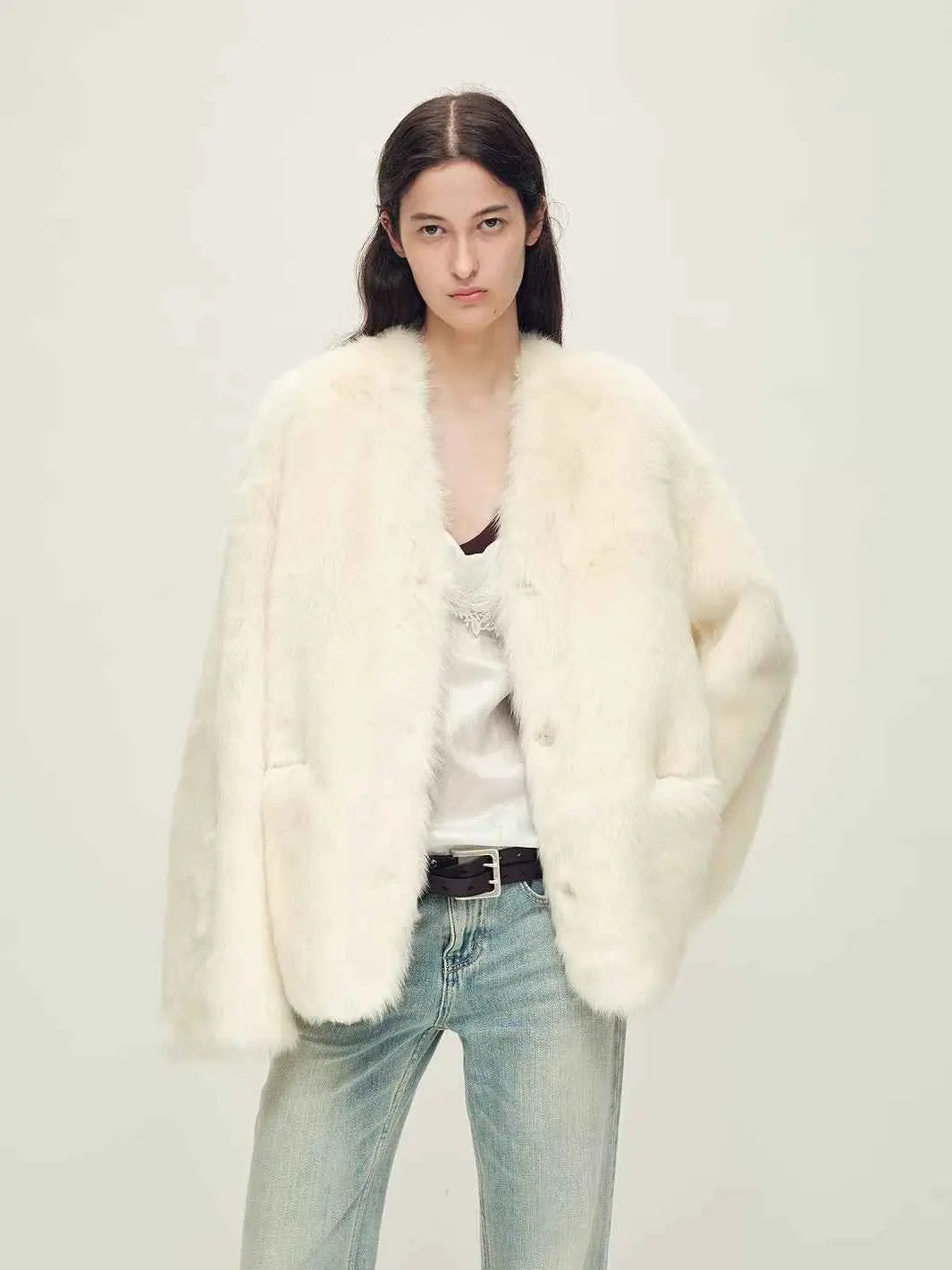 Woman wearing the Freezing Point Rum classic white Toscana shearling coat