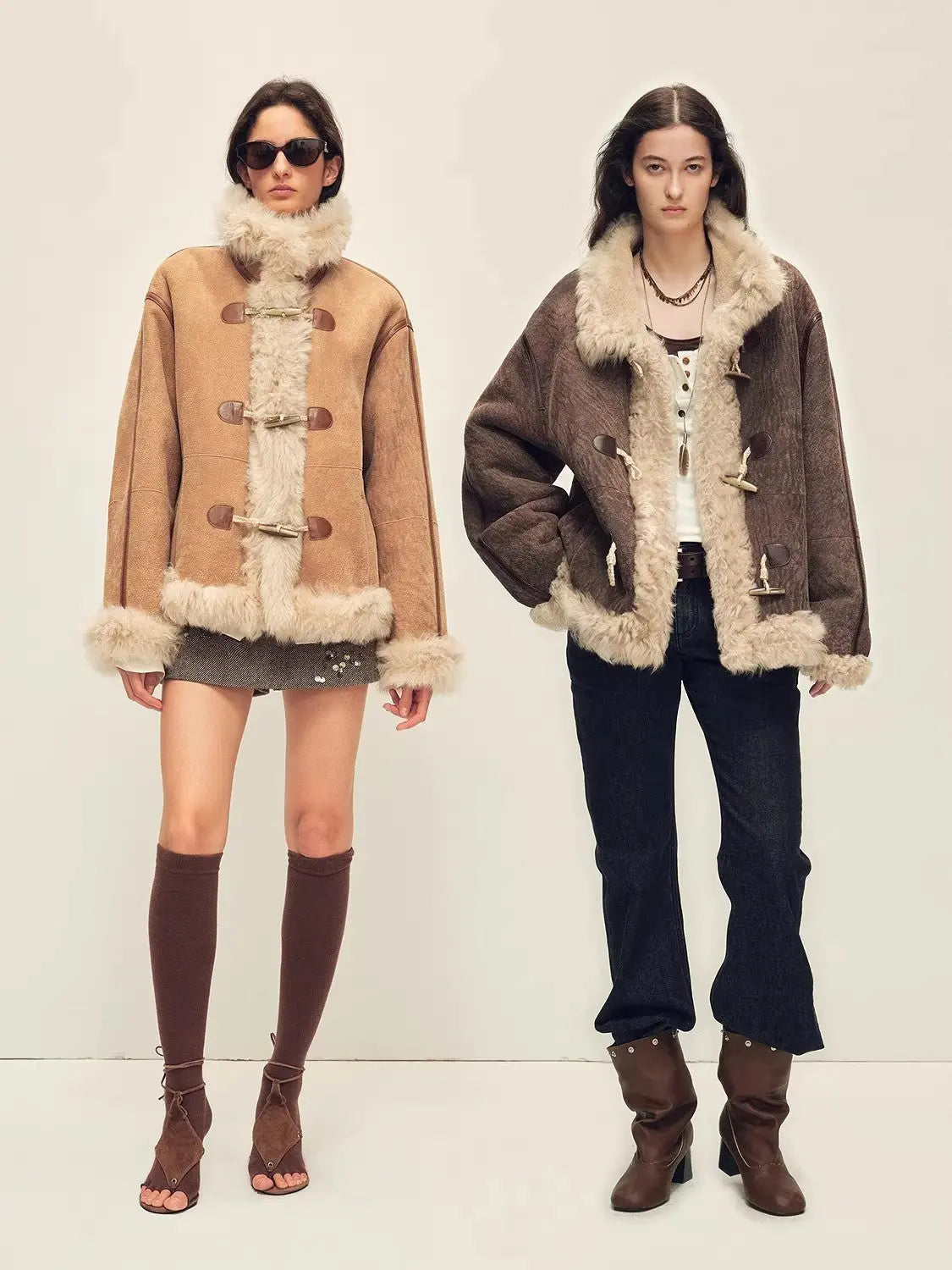 Models wearing Galaxy Gala tortoiseshell yellow and fog brown Merino shearling coats