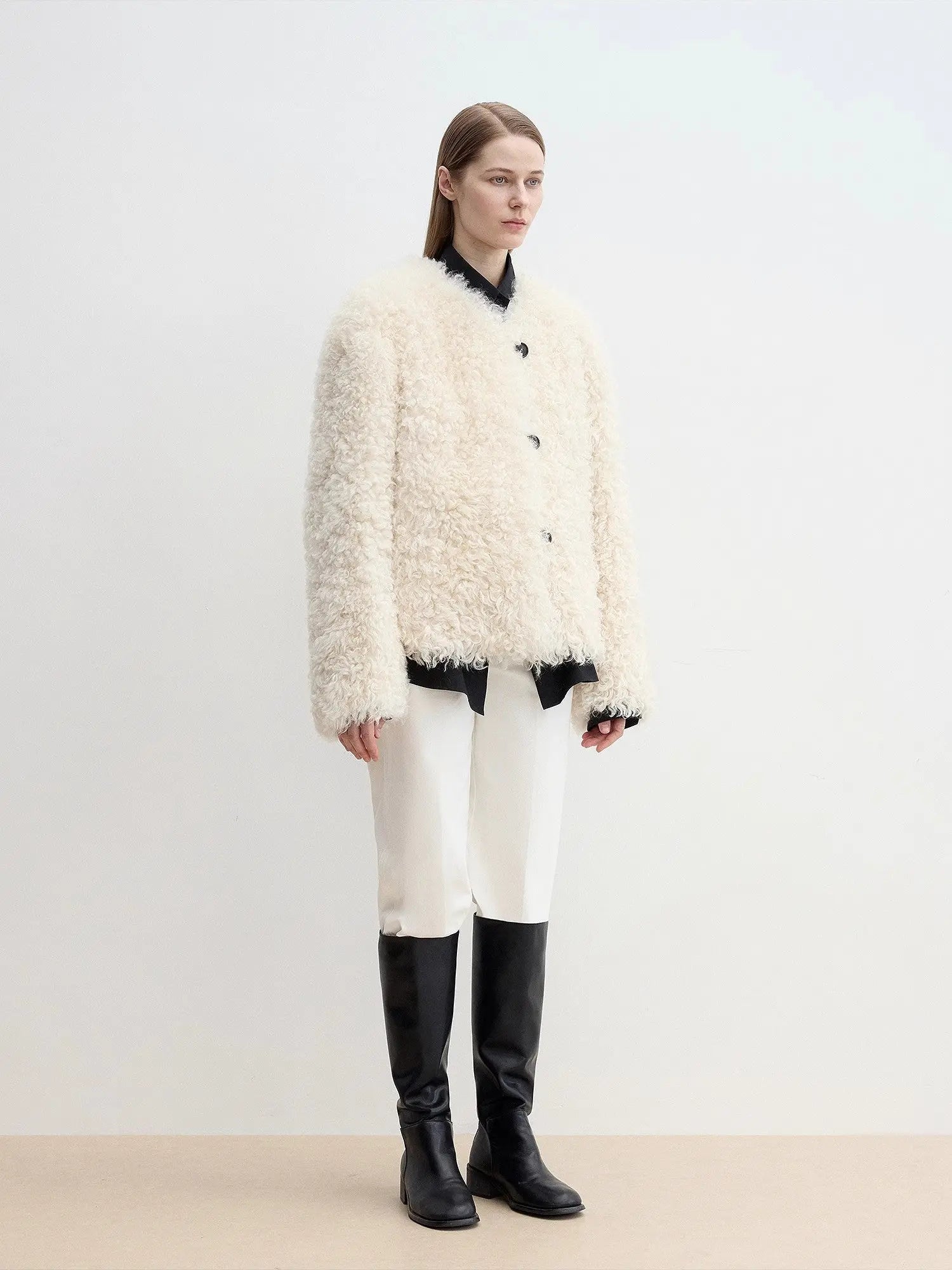 Off-white Merino curly shearling jacket, full-length side angle