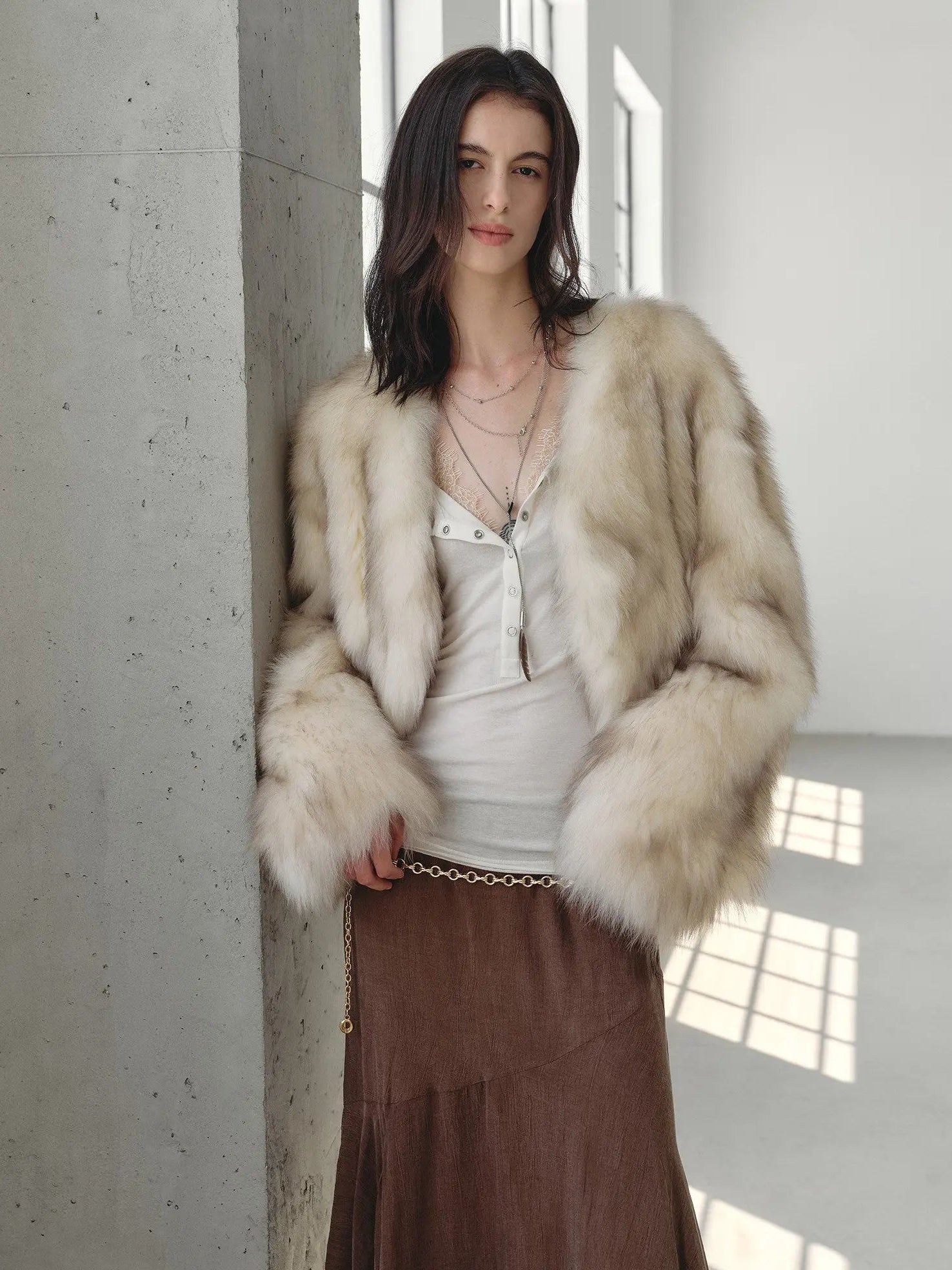 Gone with the Wind Apricot Brown fox fur coat in a natural-light setting