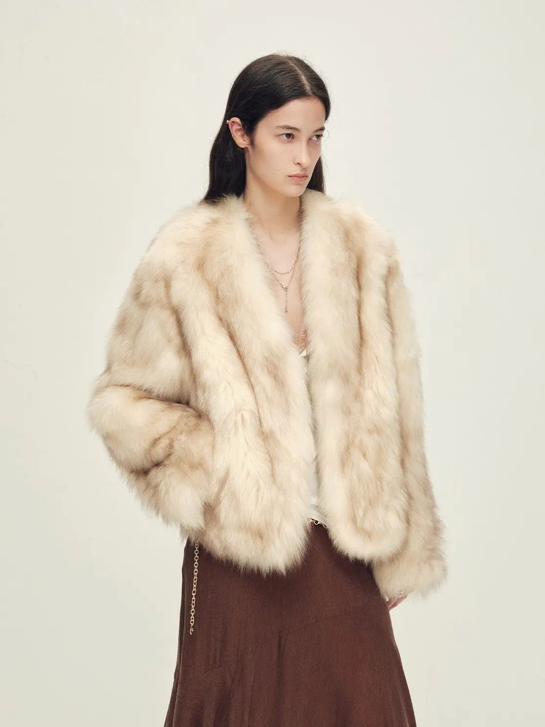 Model wearing Gone with the Wind Apricot Brown fox fur coat, front view