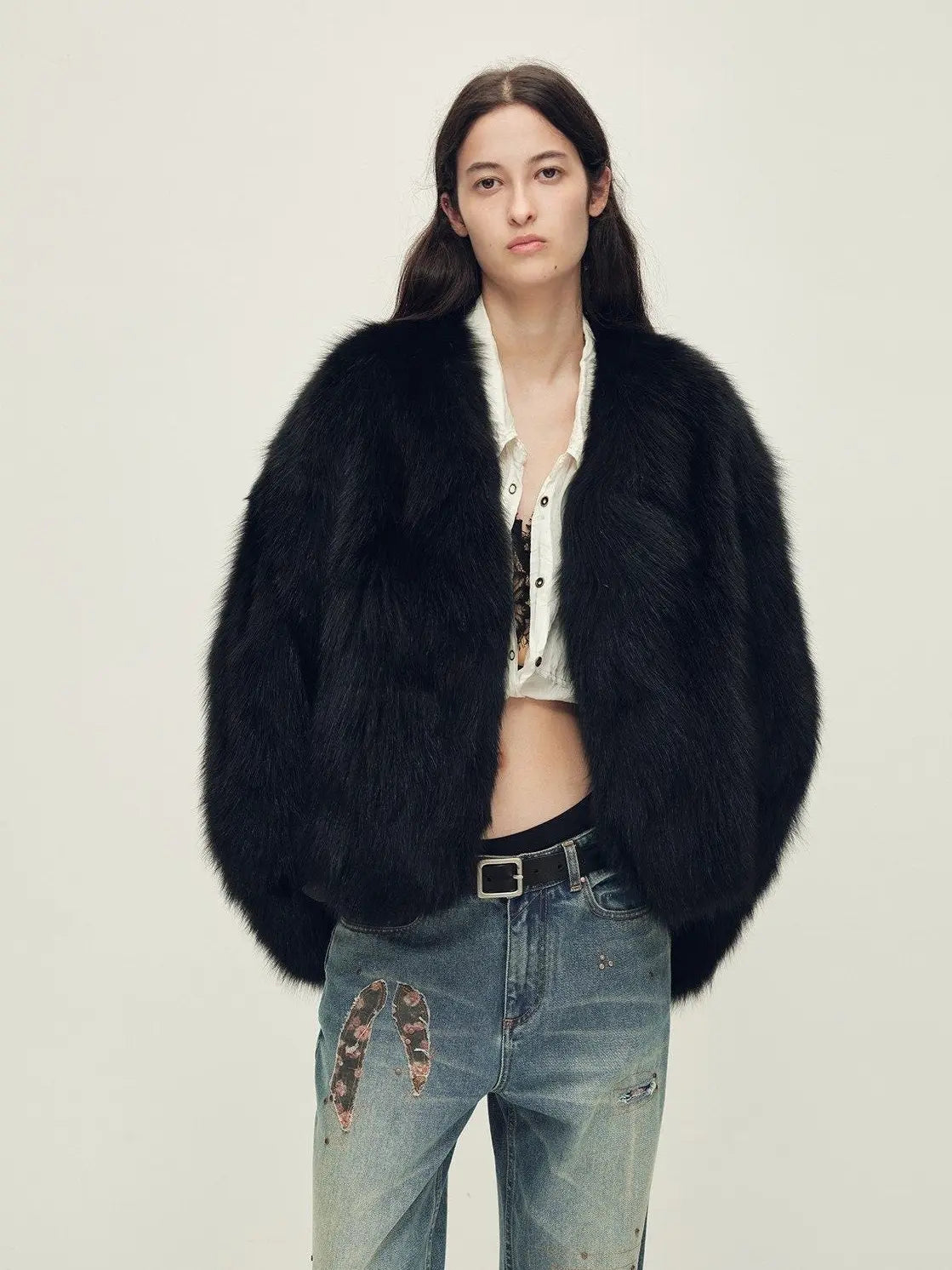 Model wearing Gone with the Wind Dark Charcoal Gray fox fur coat