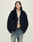 Model wearing Gone with the Wind Dark Charcoal Gray fox fur coat