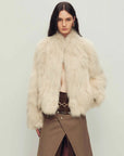 Model wearing Grace Champs-Élysées Apricot fox fur coat, front view