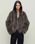 Model wearing Grace Champs-Élysées Gray-Green fox fur coat, front view