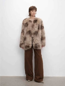 Heartbeat Caramel fox fur coat styled on model, full-length view