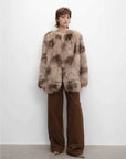 Heartbeat Caramel fox fur coat styled on model, full-length view
