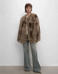 Heartbeat Caramel SagaFurs fox fur coat on model, relaxed front view