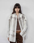 Hera Moonlight Silver Blue Cross mink coat on model, front view