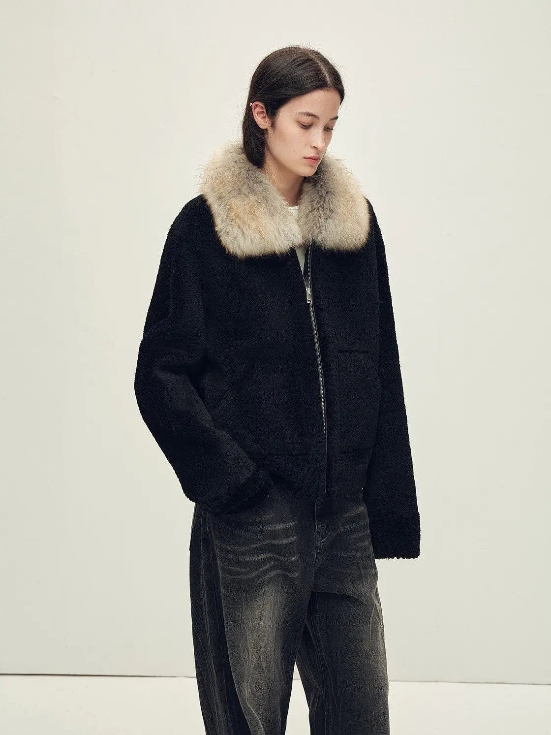 Model wearing Hokkaido Melody black short collar Merino shearling coat