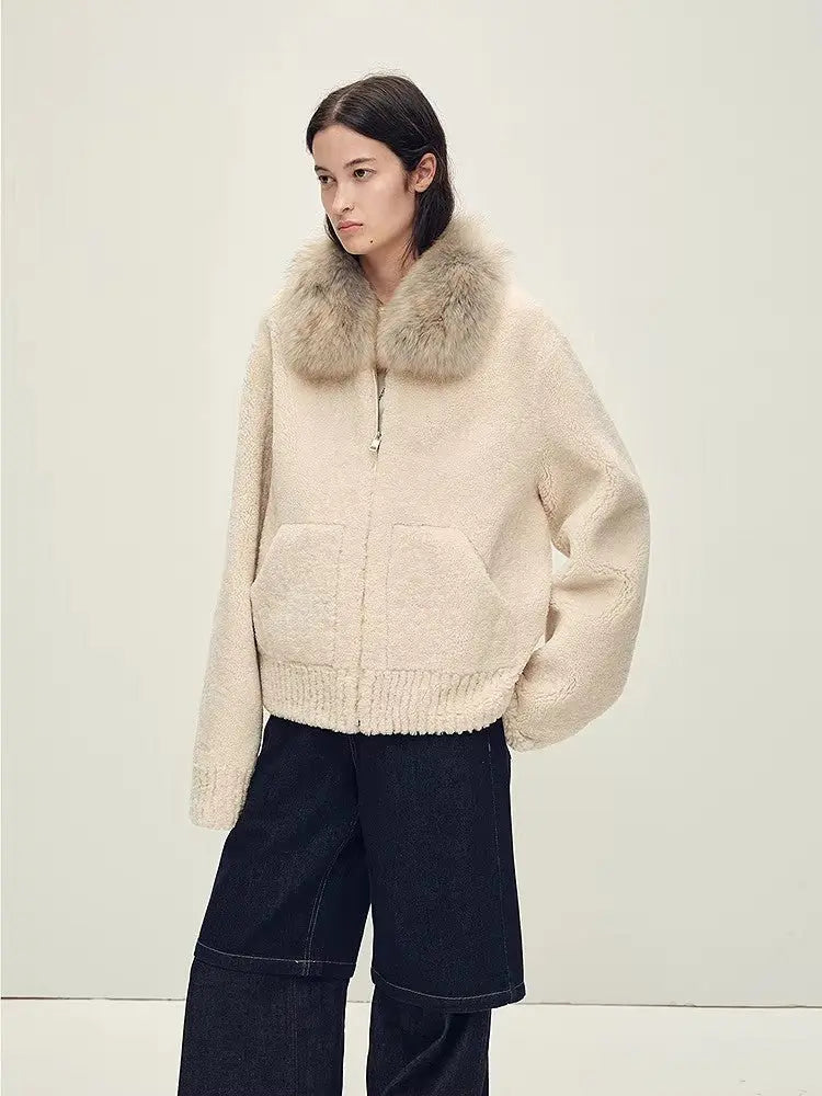 Model wearing Hokkaido Melody off-white short collar Merino shearling coat, full-length view