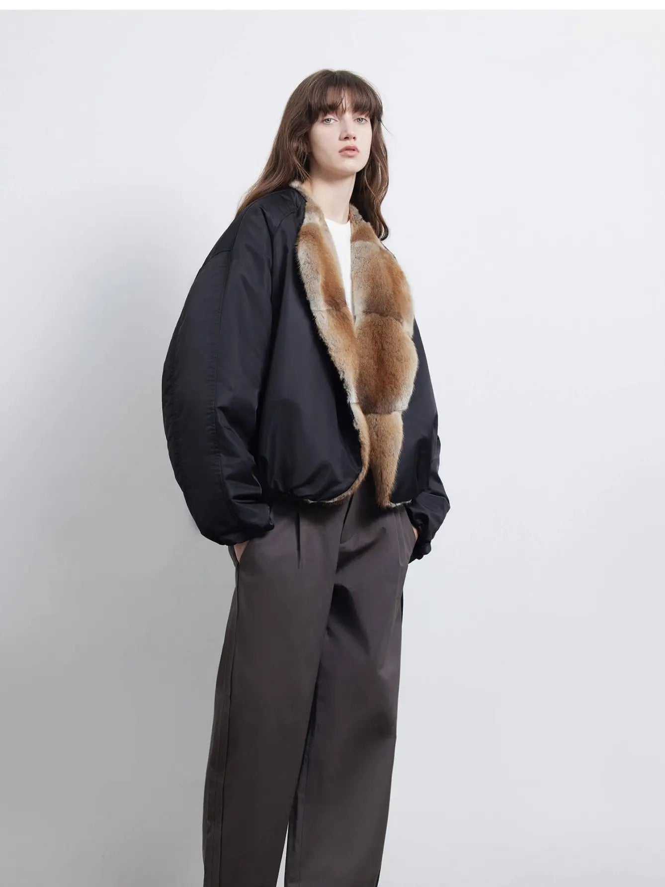 Side model view of Fireladyfur Hull Contract Classic Black fur collar down parka