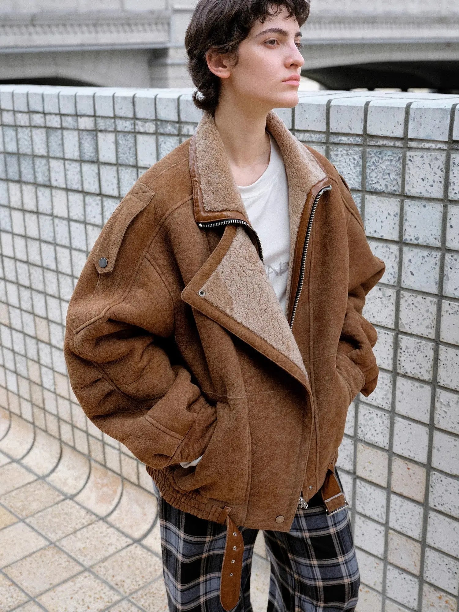 Woman styling the Jazz Party brown Merino shearling jacket outdoors