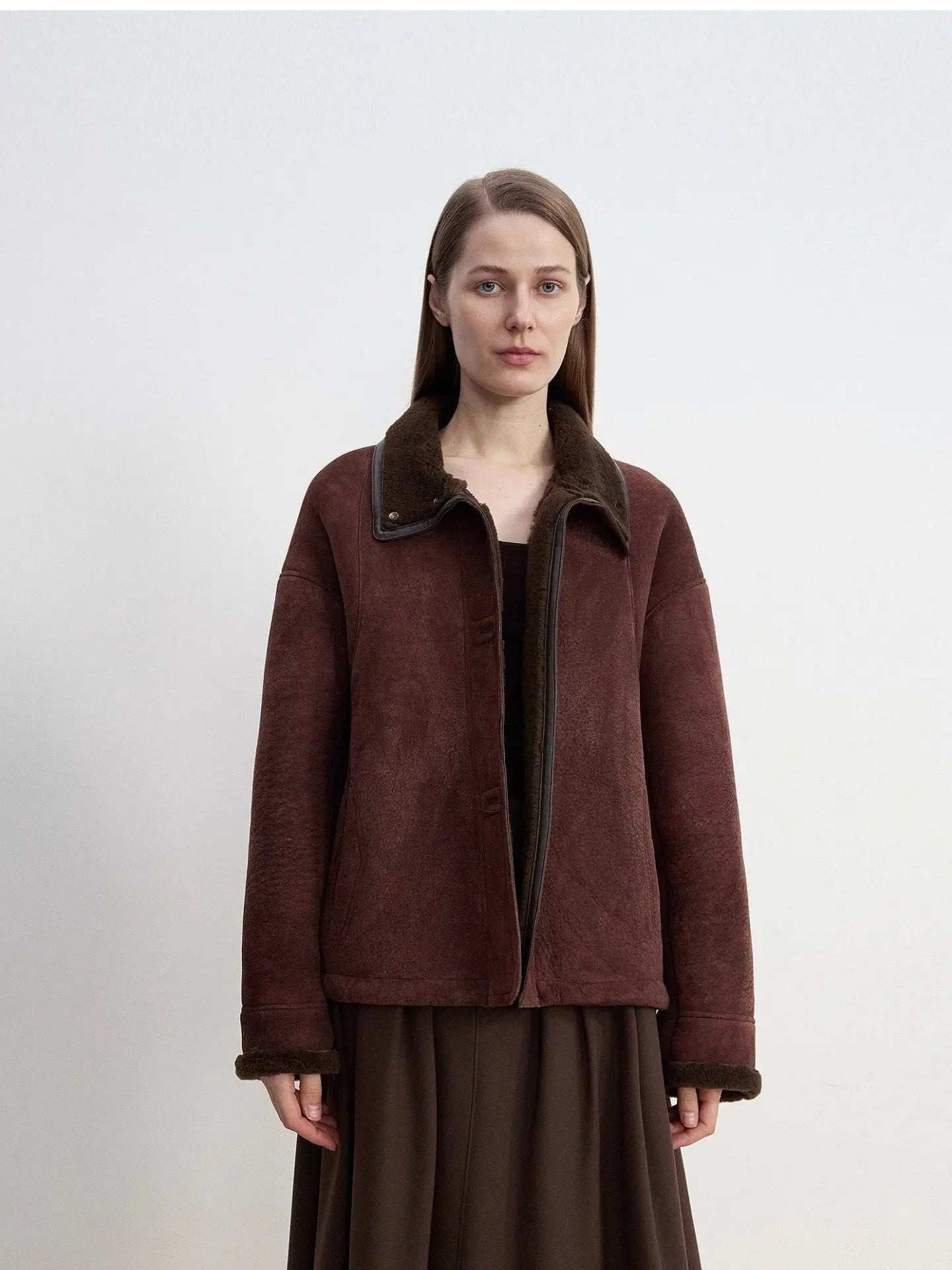 Knight's Contract reddish brown shearling winter coat styled on model