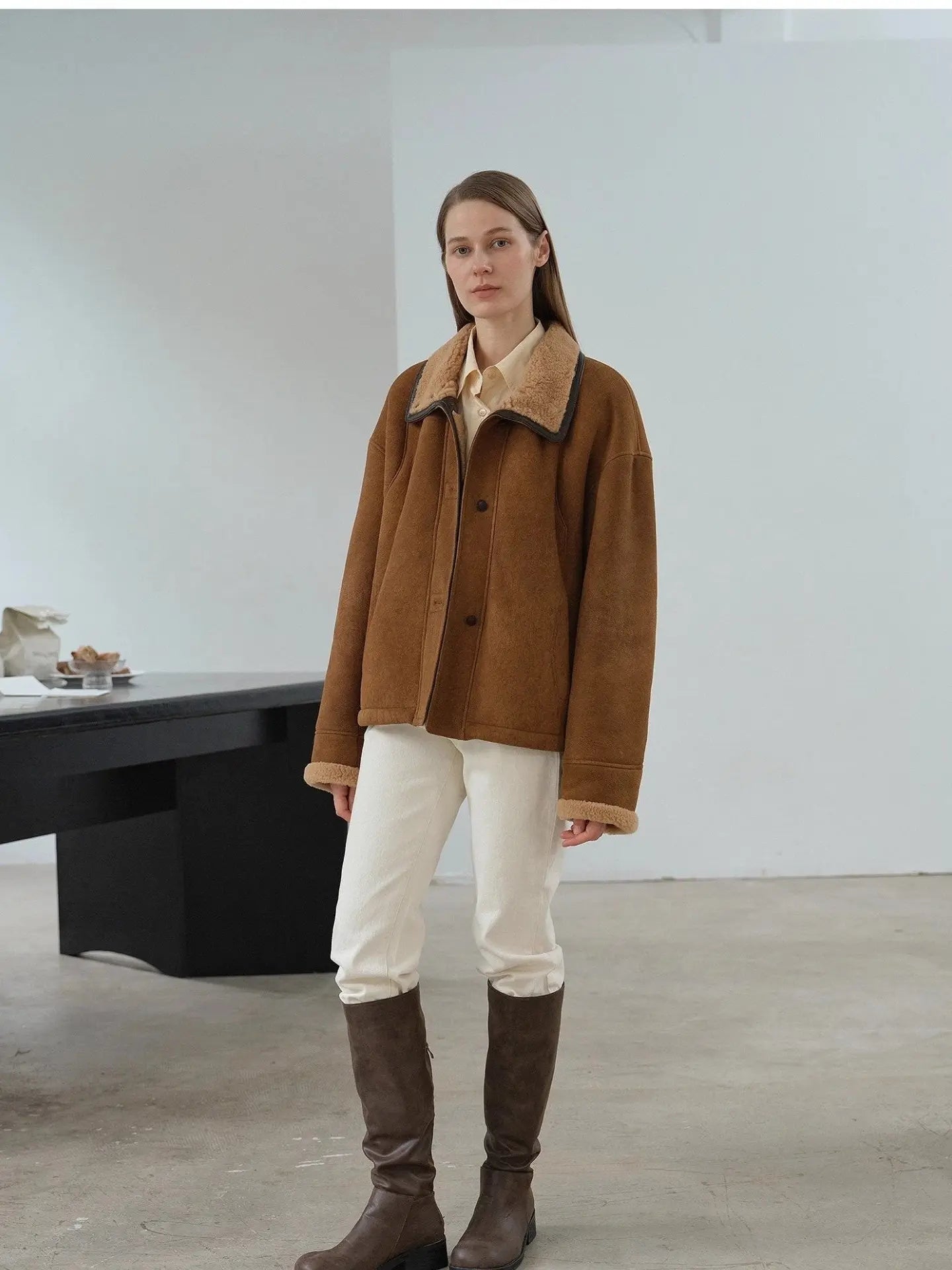 Knight's Contract yellowish brown shearling winter coat styled on model