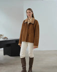 Knight's Contract yellowish brown shearling winter coat styled on model