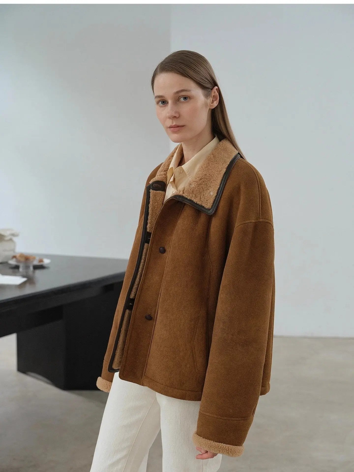 Model view of yellowish brown Merino shearling fur collar coat