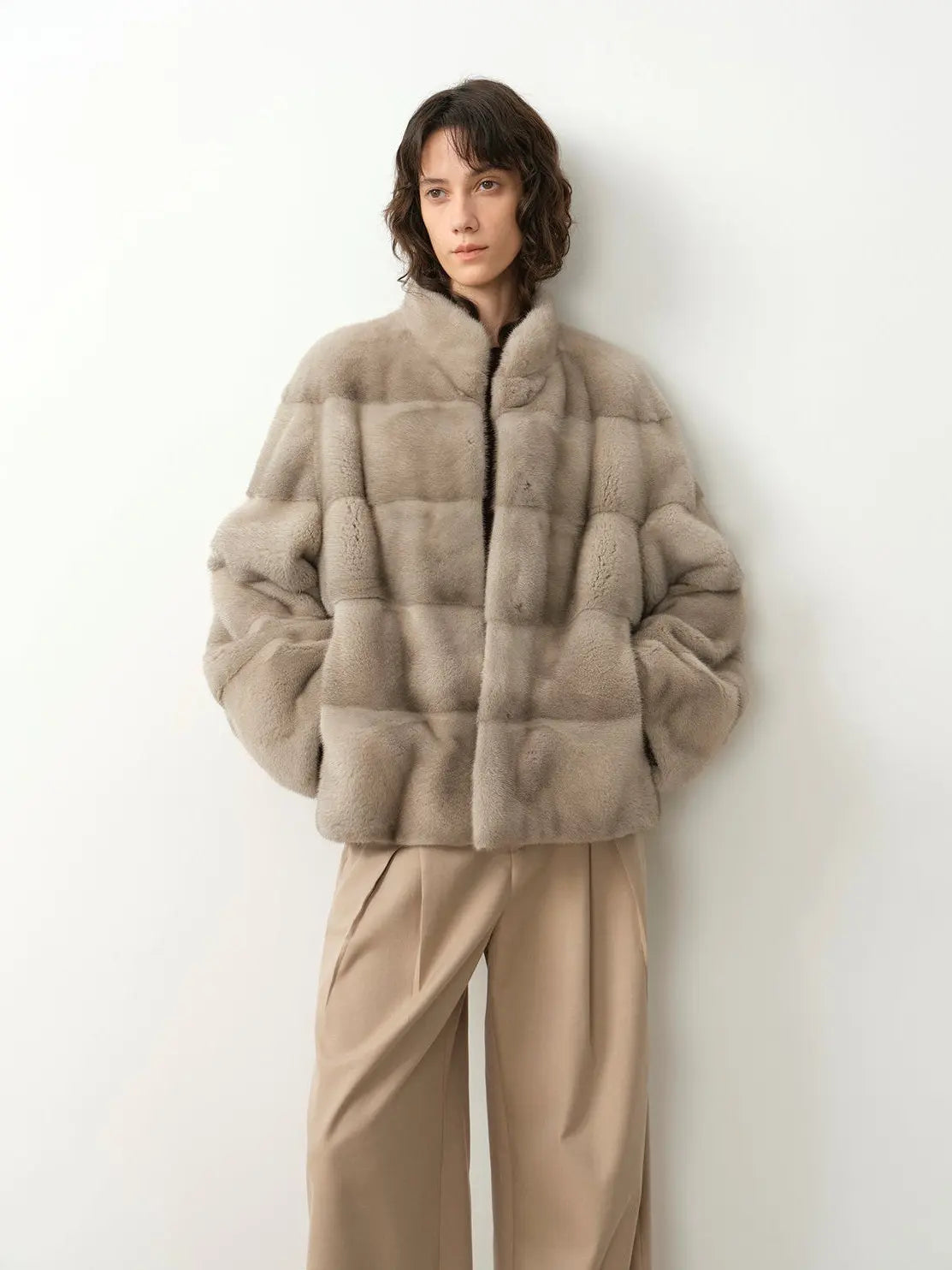 Legacy Mink neutral taupe stand-collar coat on model