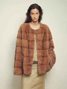 Legacy Mink Latte round-neck coat on model