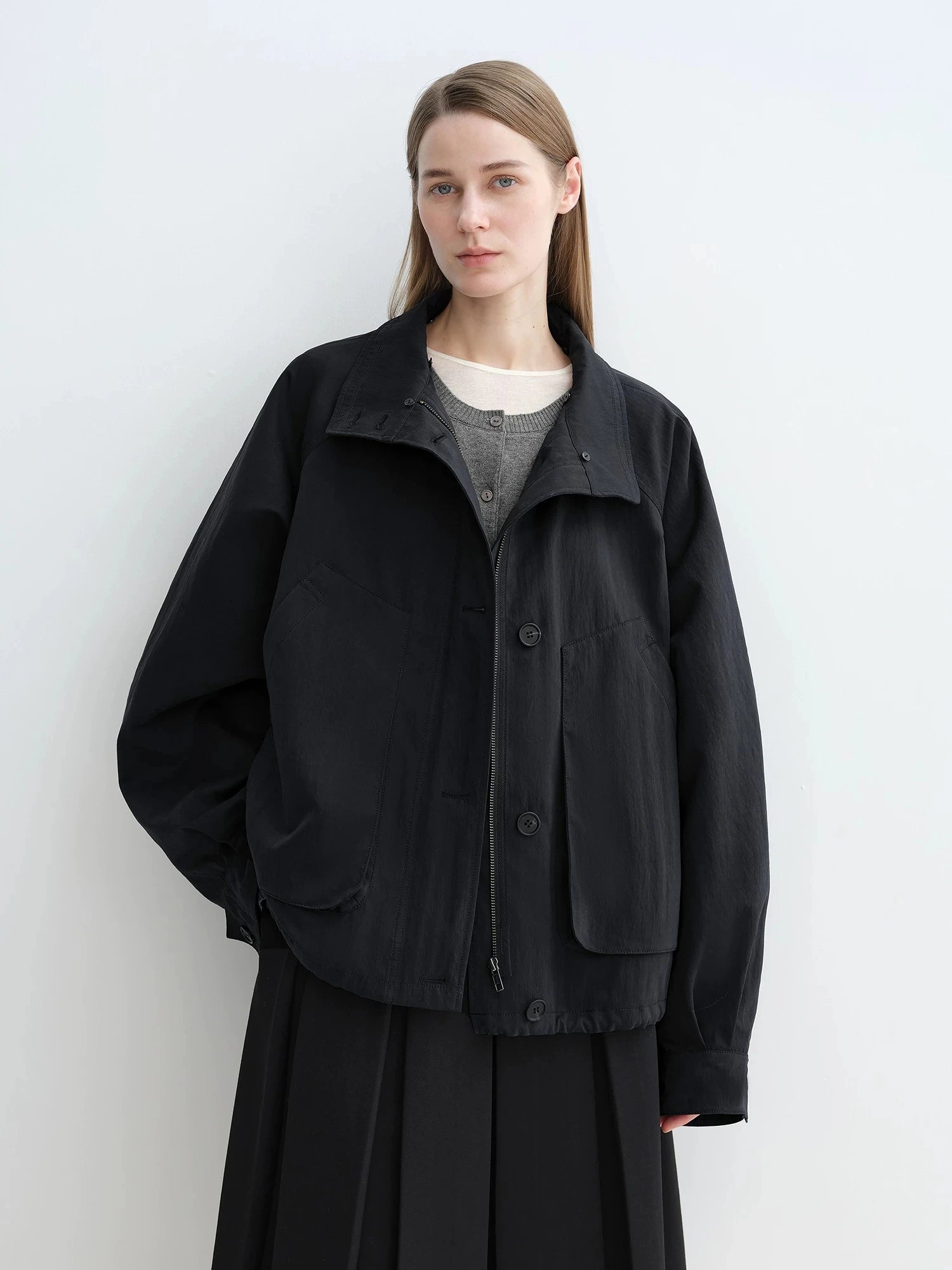 Black Letrans Silent Trace down parka shown open with removable liner