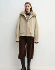 Full body front view of khaki Letrans Silent Trace detachable down parka