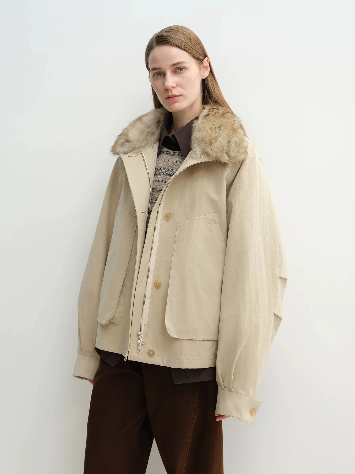 Khaki Letrans Silent Trace down parka with raccoon fur collar half front view