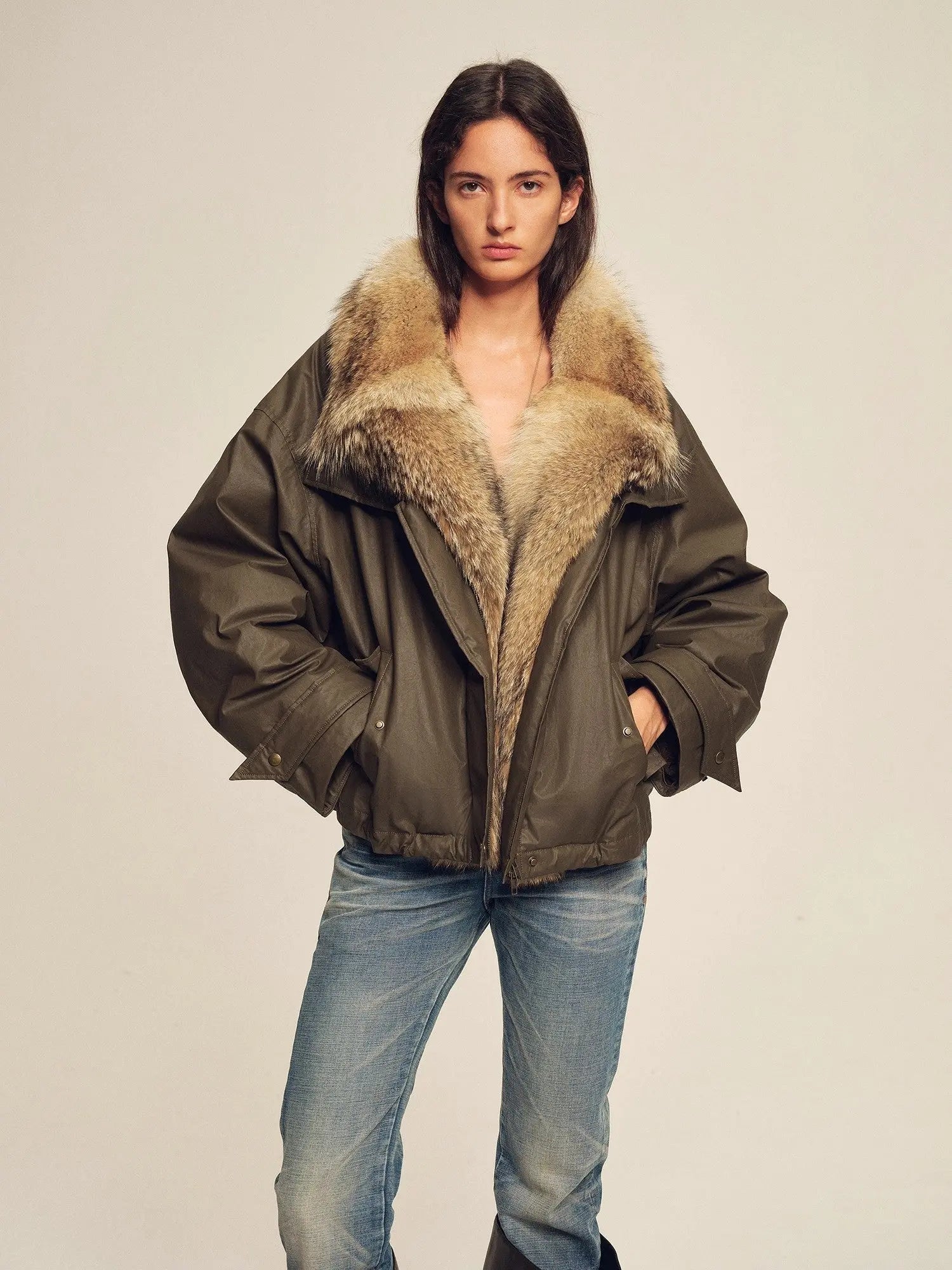 Model wearing Firelady Fur The Long Night Is Coming Greenish-Brown wolf fur parka front view