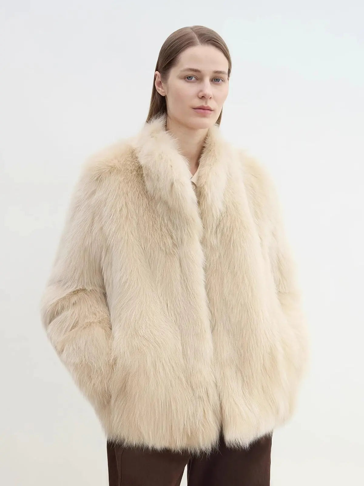 Long Nocturne apricot Saga fox fur coat on model close-up