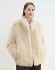 Long Nocturne apricot Saga fox fur coat on model close-up