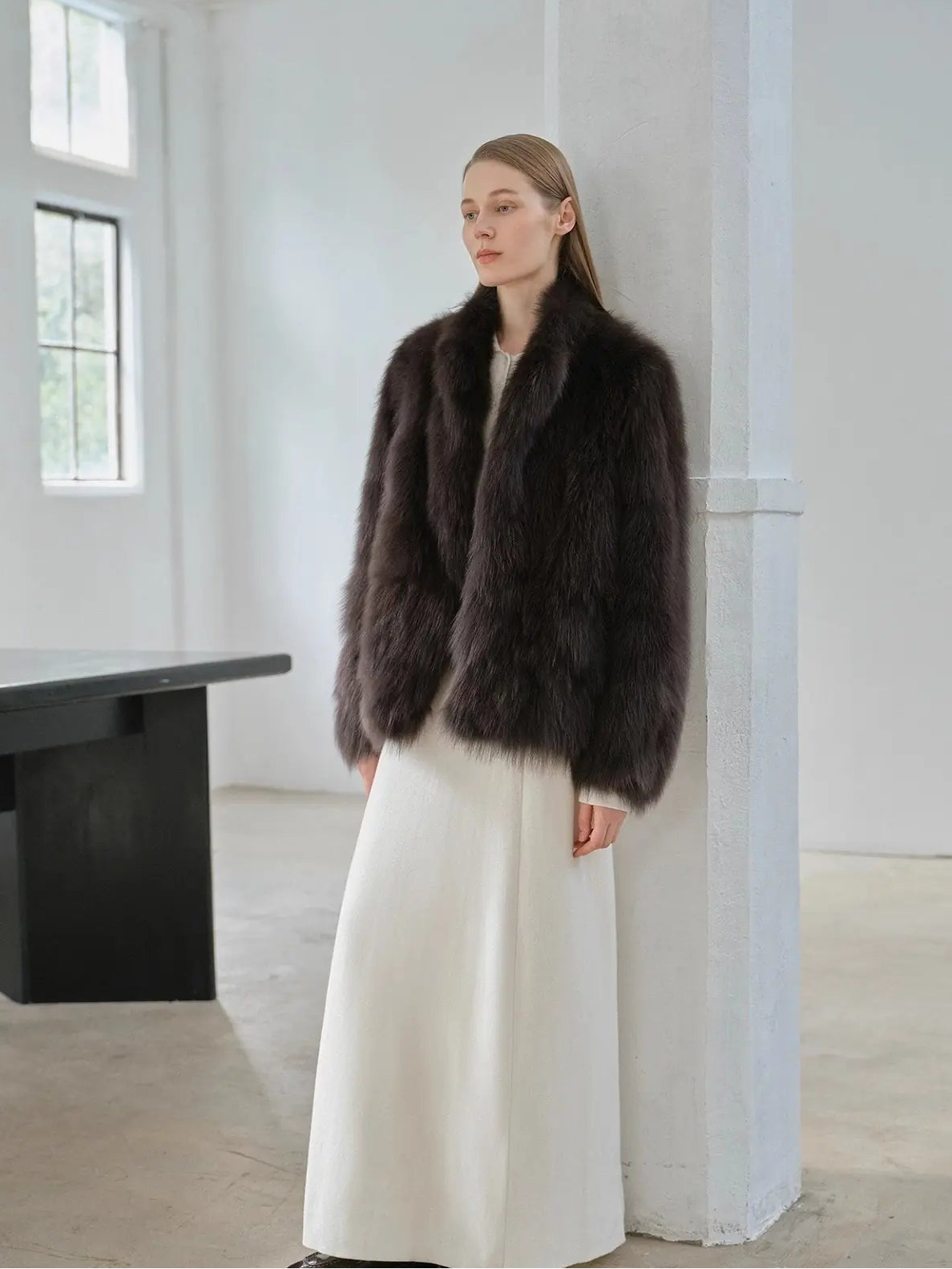 Long Nocturne black Saga fox fur coat styled on model