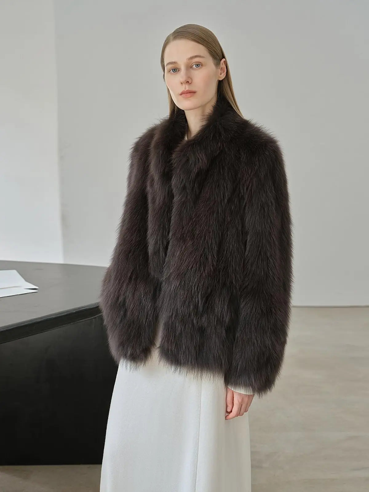Long Nocturne black Saga fox fur coat side model view